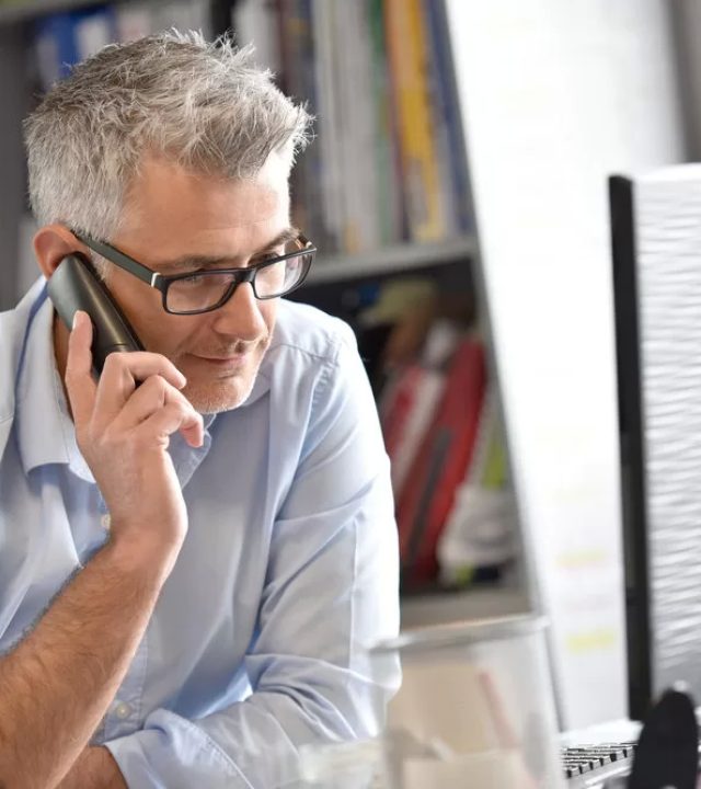 Businessman in Office Talking Qxlwt24l0jgk3kwour6cud13vun73d46vl1vdm7k80